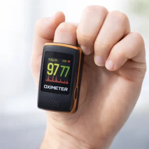PC-60 Creative Pulse Oximeter on patient finger with readings on screen